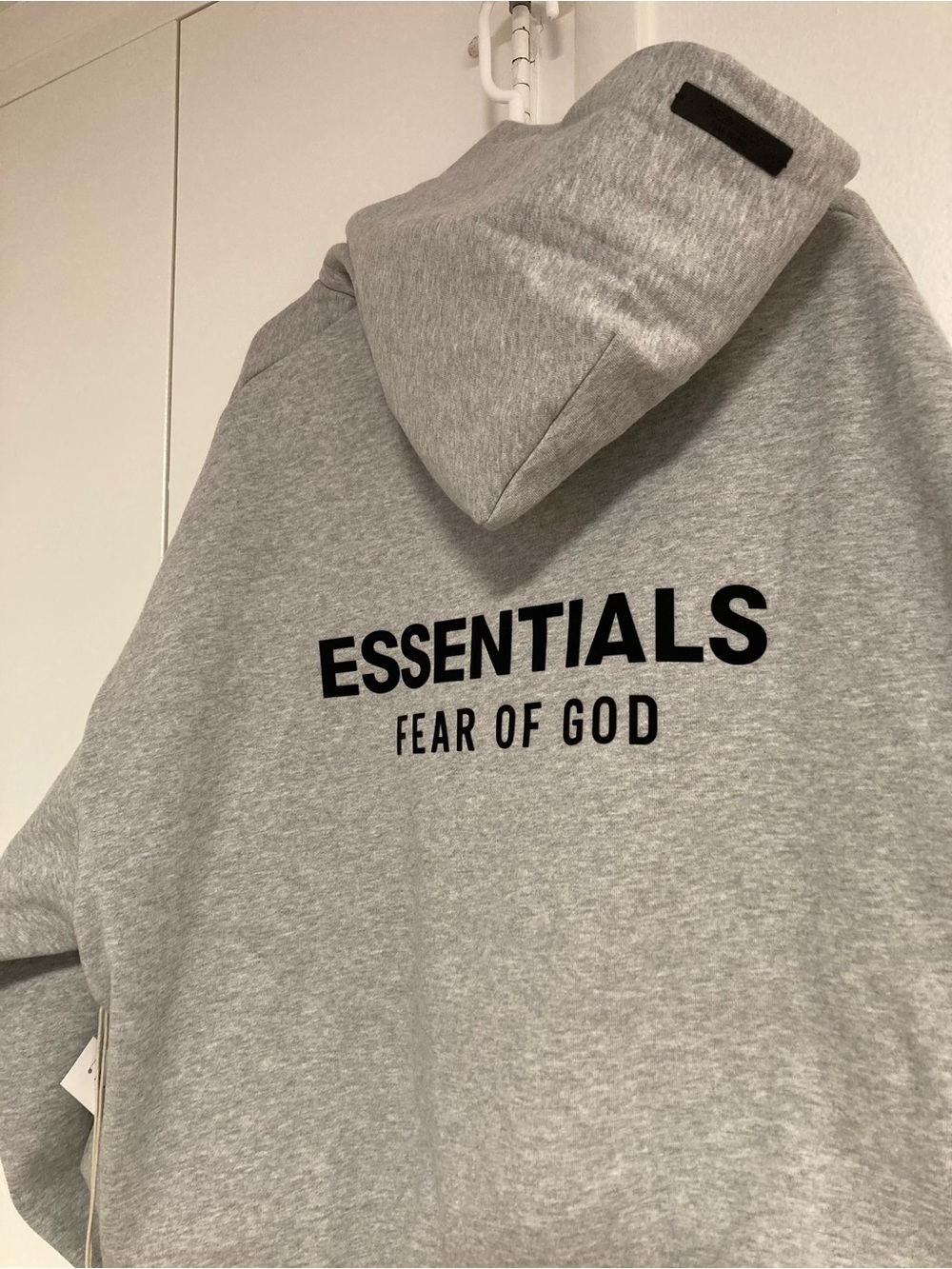 Fear of God ESSENTIALS Light Gray Hoodie with Black Logo